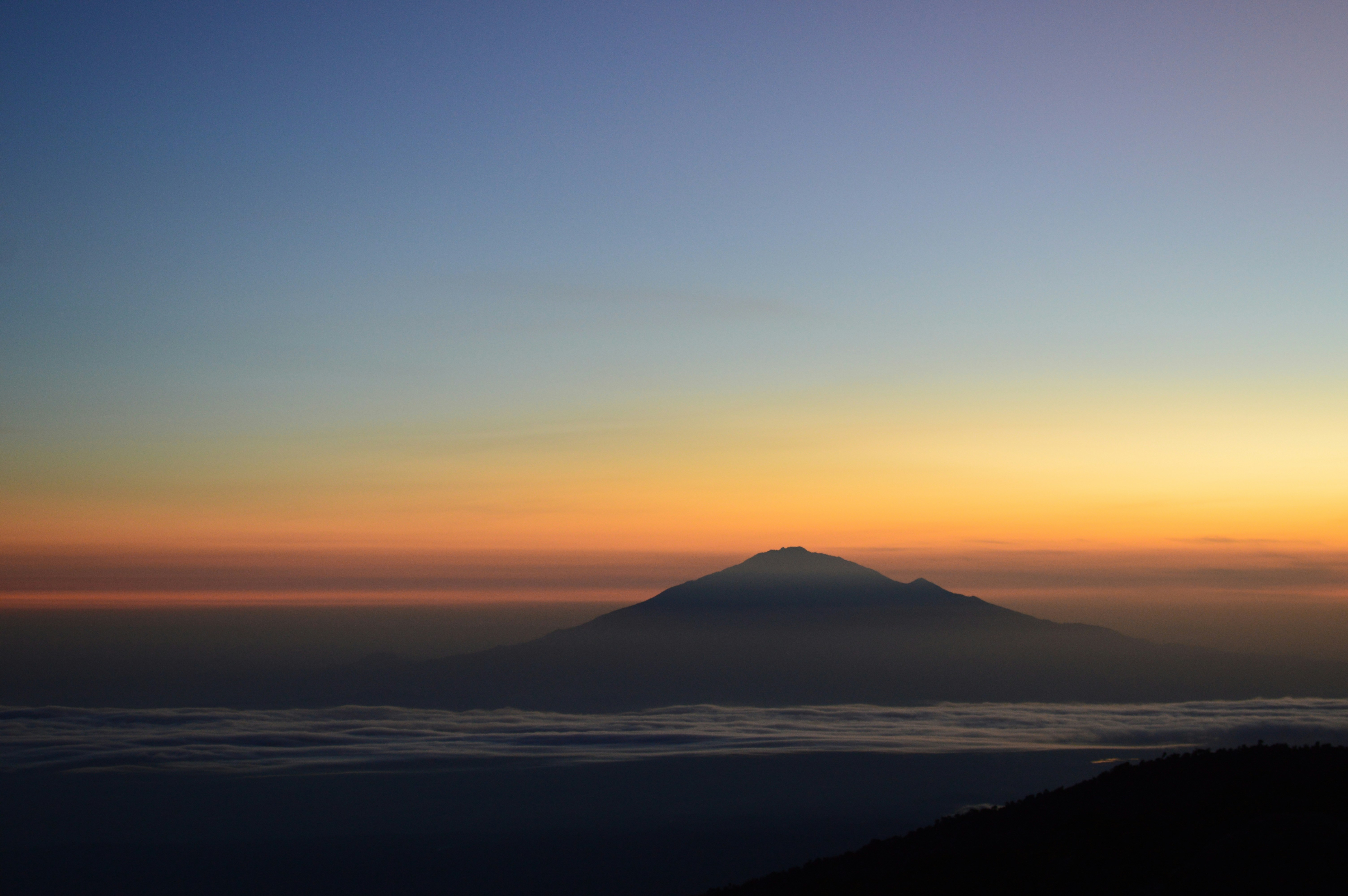 Mount Kilimanjaro silhouetted against sunrise