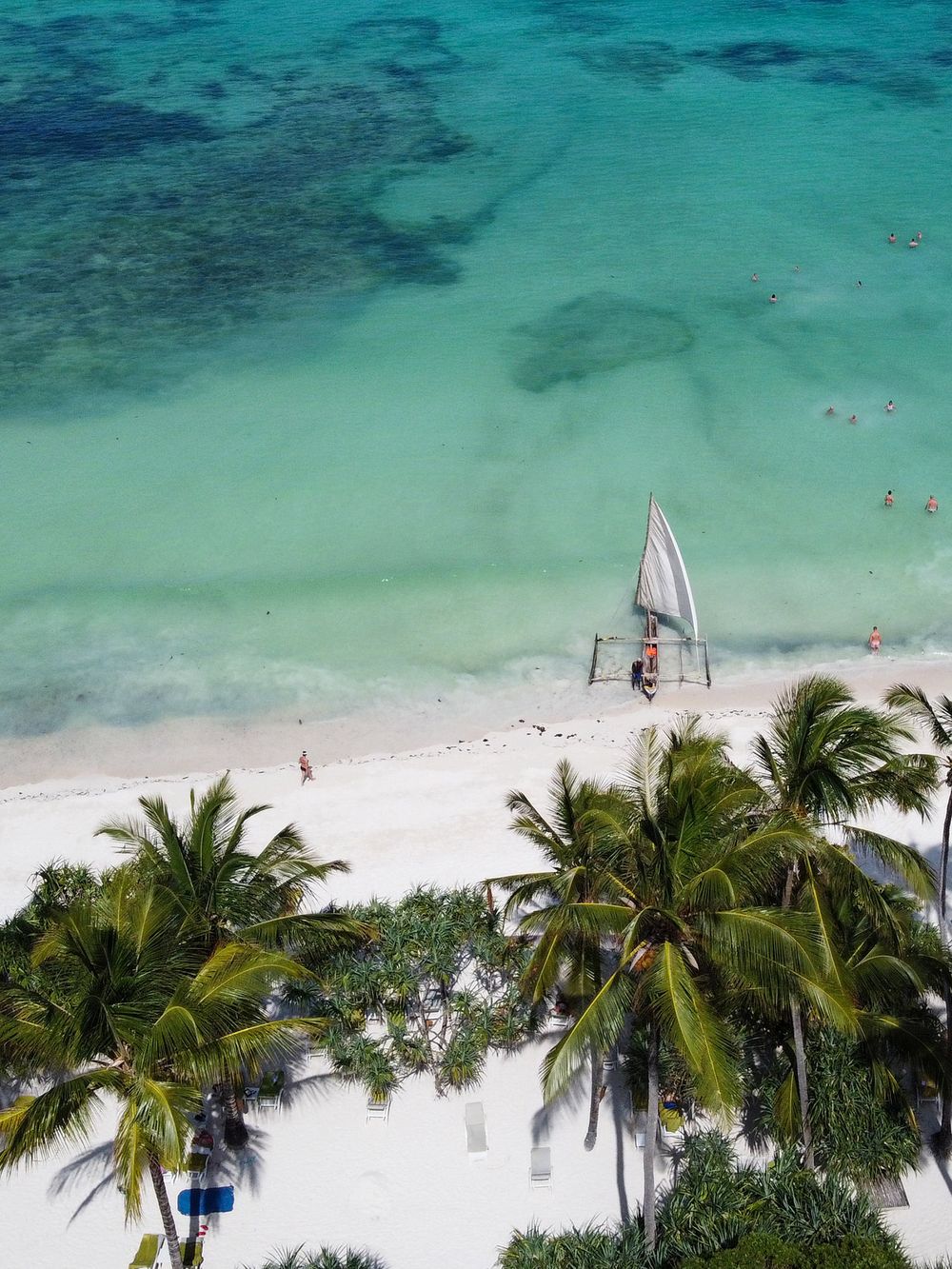 Aerial view of a Zanzibar beach with a dhow