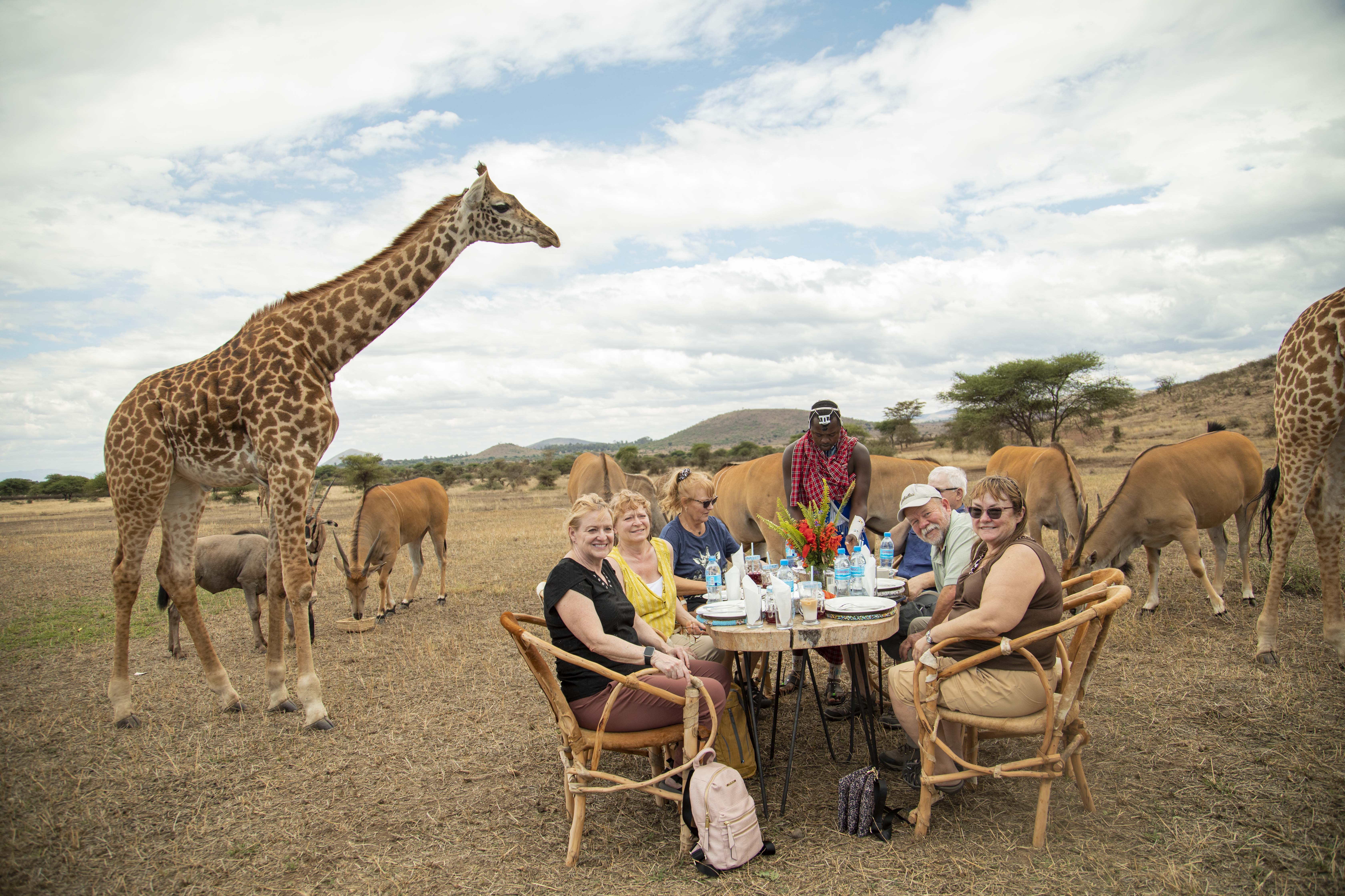 Excellent Guides guests and team sharing a safari moment in Tanzania